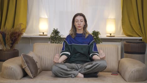 The-meditating-young-woman.